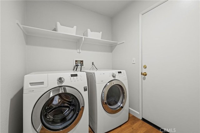 28238 Alton Way, Castaic, CA 91384 - washroom featuring washing machine and clothes dryer and light wood-style flooring