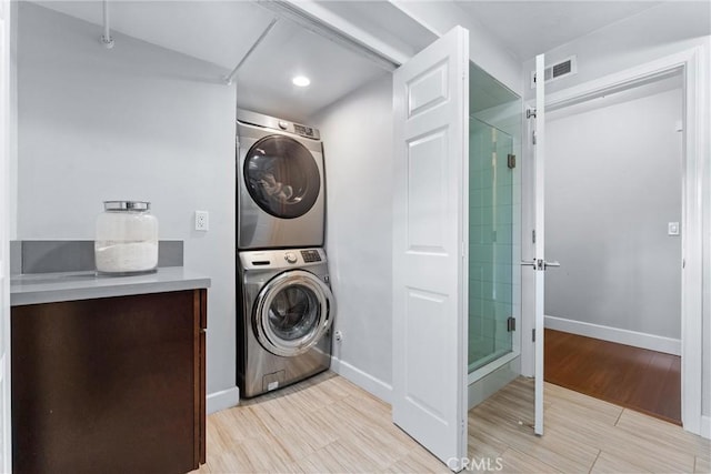 1780 N Mockingbird Pl, Orange, CA 92867 - laundry area with stacked washing machine and dryer, light wood finished floors, and recessed lighting