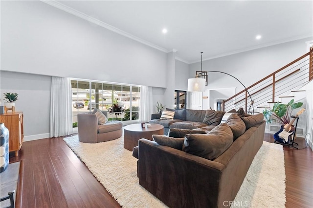 1780 N Mockingbird Pl, Orange, CA 92867 - living room with stairs, dark wood finished floors, ornamental molding, recessed lighting, and a high ceiling