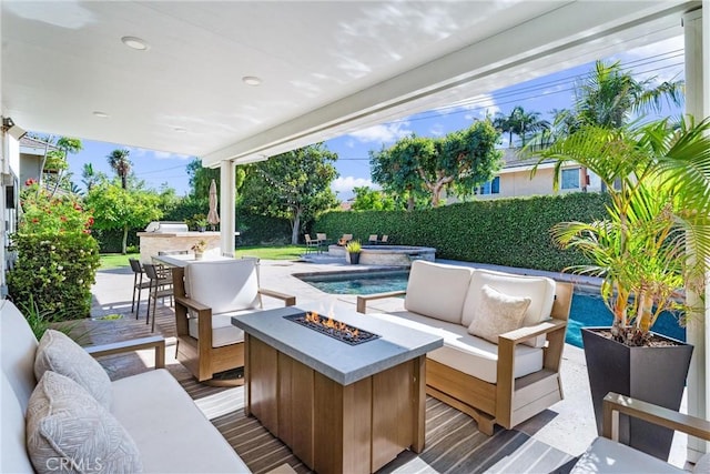 1780 N Mockingbird Pl, Orange, CA 92867 - fenced backyard with an outdoor living space with a fire pit, exterior bar, a patio area, and area for grilling