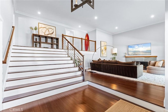 1780 N Mockingbird Pl, Orange, CA 92867 - stairs featuring crown molding, recessed lighting, and wood finished floors