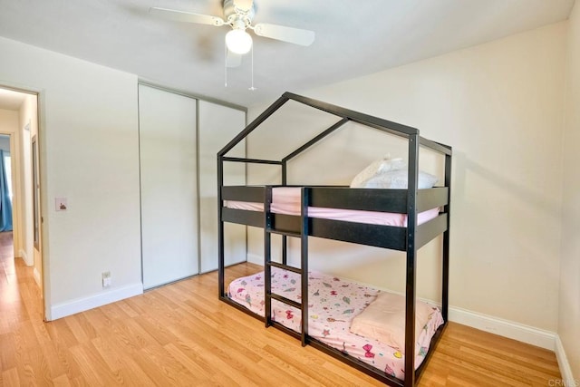 826 Laurelwood Ct, San Marcos, CA 92069 - unfurnished bedroom with wood finished floors, a closet, and a ceiling fan