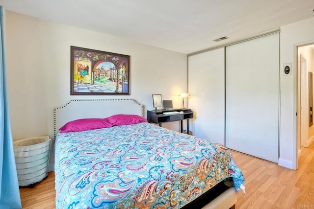 826 Laurelwood Ct, San Marcos, CA 92069 - bedroom with wood finished floors and a closet