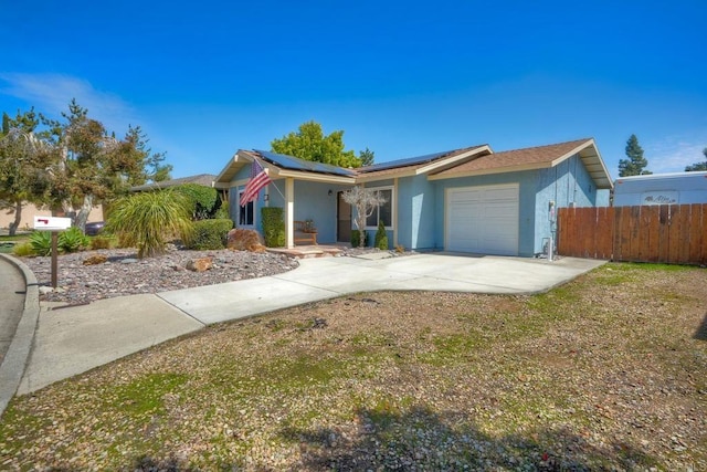 826 Laurelwood Ct, San Marcos, CA 92069 - ranch-style house featuring a garage, stucco siding, driveway, and solar panels