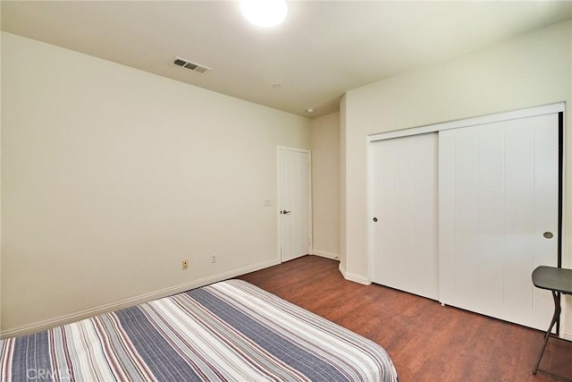 13288 Cactus Flower St, Eastvale, CA 92880 - unfurnished bedroom with wood finished floors and a closet