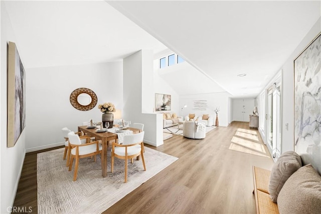 18701 Paseo Cortez, Irvine, CA 92603 - dining space featuring healthy amount of natural light, wood finished floors, and lofted ceiling