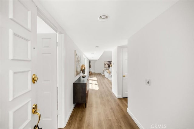 18701 Paseo Cortez, Irvine, CA 92603 - hallway featuring baseboards and wood finished floors