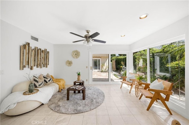 18701 Paseo Cortez, Irvine, CA 92603 - living area with light tile patterned floors, ceiling fan, and recessed lighting
