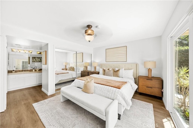 18701 Paseo Cortez, Irvine, CA 92603 - bedroom featuring wood finished floors, ceiling fan, ensuite bath, and a closet
