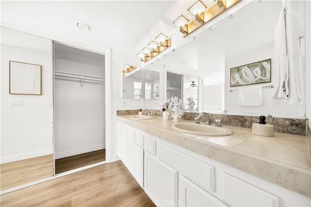 18701 Paseo Cortez, Irvine, CA 92603 - bathroom with double vanity and wood finished floors