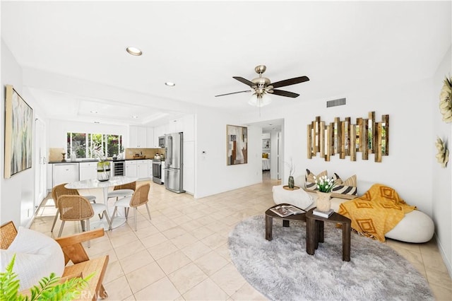 18701 Paseo Cortez, Irvine, CA 92603 - living area featuring recessed lighting, light tile patterned floors, and ceiling fan