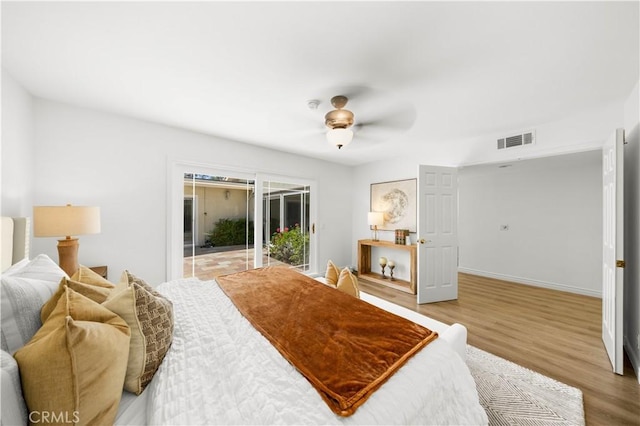 18701 Paseo Cortez, Irvine, CA 92603 - bedroom with access to exterior, wood finished floors, and a ceiling fan