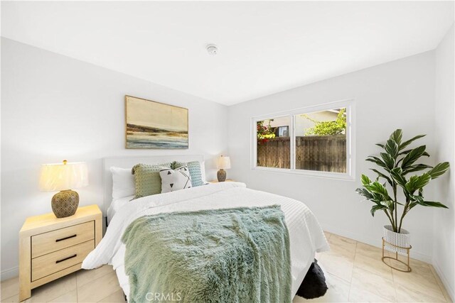 18701 Paseo Cortez, Irvine, CA 92603 - bedroom with light tile patterned floors and baseboards
