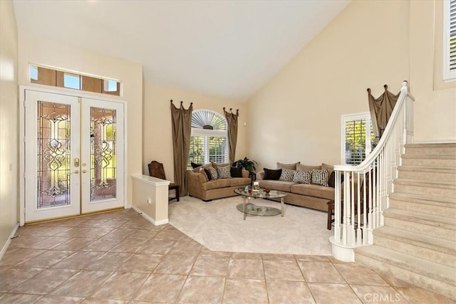 12487 Altura Dr, Rancho Cucamonga, CA 91739 - living area featuring french doors, high vaulted ceiling, plenty of natural light, and stairs