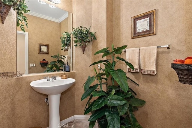 12487 Altura Dr, Rancho Cucamonga, CA 91739 - bathroom featuring crown molding and a sink