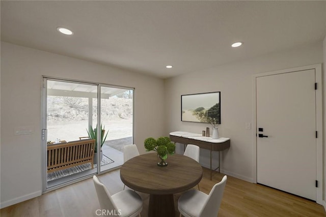 27825 Beryl Rd, Barstow, CA 92311 - dining space featuring light wood-style floors and recessed lighting