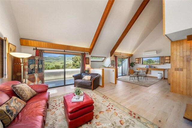1505 Tiffany Ranch Rd, Arroyo Grande, CA 93420 - living room with high vaulted ceiling, wood finished floors, beamed ceiling, and wood walls