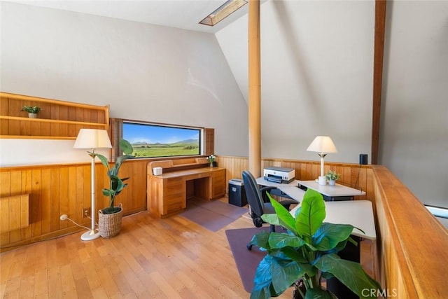 1505 Tiffany Ranch Rd, Arroyo Grande, CA 93420 - home office with wainscoting, light wood-style flooring, a skylight, lofted ceiling, and wooden walls