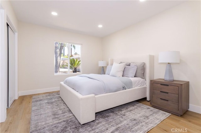 20611 Devonshire St, Chatsworth, CA 91311 - bedroom featuring light wood-type flooring, recessed lighting, and a closet