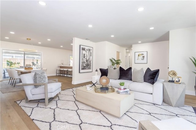 20611 Devonshire St, Chatsworth, CA 91311 - living room with recessed lighting and light wood finished floors