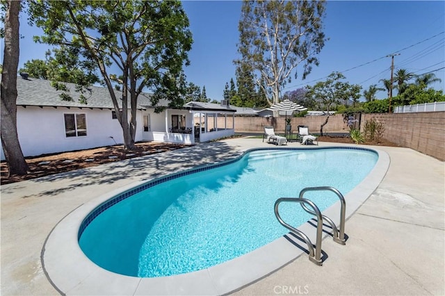 20611 Devonshire St, Chatsworth, CA 91311 - view of swimming pool featuring a patio area and a fenced backyard