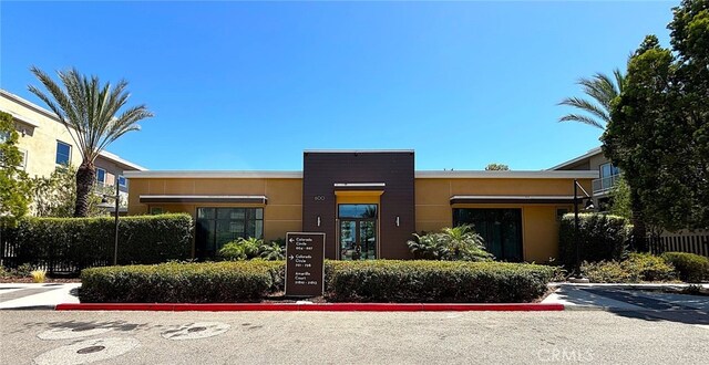 612 E Carson St Unit 303, Carson, CA 90745 - view of property featuring uncovered parking