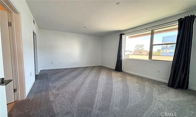 612 E Carson St Unit 303, Carson, CA 90745 - carpeted empty room featuring baseboards