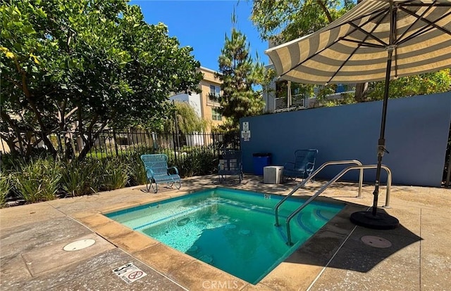 612 E Carson St Unit 303, Carson, CA 90745 - view of swimming pool with a pool and a patio area