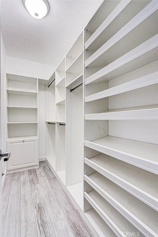 5410 W 149th Pl Unit 12, Hawthorne, CA 90250 - spacious closet featuring light wood-style floors