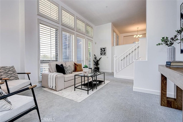 5410 W 149th Pl Unit 12, Hawthorne, CA 90250 - carpeted living area with a chandelier and stairway
