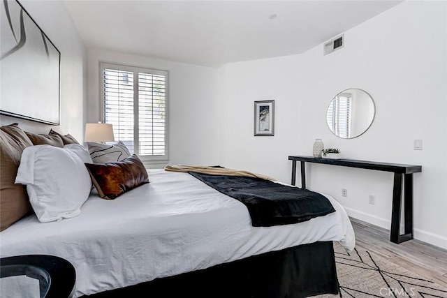 5410 W 149th Pl Unit 12, Hawthorne, CA 90250 - bedroom with light wood finished floors and baseboards