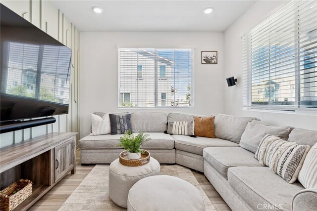 10 Wisteria St, Rancho Mission Viejo, CA 92694 - living room with light wood-type flooring, plenty of natural light, and recessed lighting