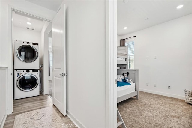 10 Wisteria St, Rancho Mission Viejo, CA 92694 - washroom featuring estacked washer and dryer and recessed lighting