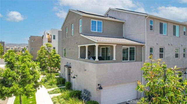 10 Wisteria St, Rancho Mission Viejo, CA 92694 - view of front of home featuring stucco siding and a garage
