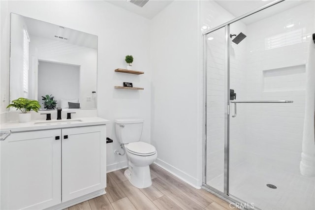 10 Wisteria St, Rancho Mission Viejo, CA 92694 - full bathroom featuring vanity, wood finished floors, and a shower stall