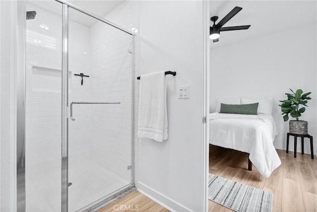 10 Wisteria St, Rancho Mission Viejo, CA 92694 - ensuite bathroom with wood finished floors, a shower stall, and a ceiling fan