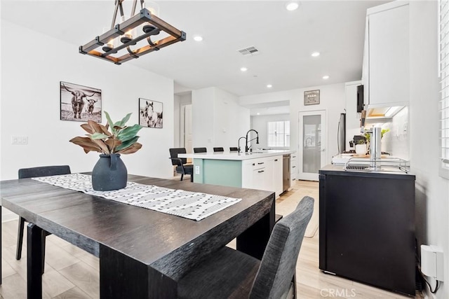 10 Wisteria St, Rancho Mission Viejo, CA 92694 - dining space with recessed lighting, a chandelier, and light wood-style floors