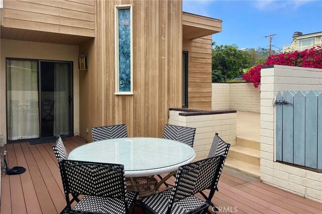 390 Saint Anns Dr, Laguna Beach, CA 92651 - deck with outdoor dining space and a gate