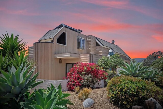 390 Saint Anns Dr, Laguna Beach, CA 92651 - view of side of property featuring a garage