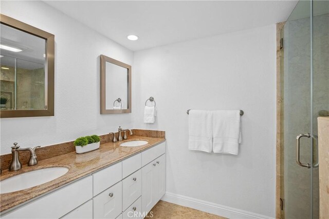 390 Saint Anns Dr, Laguna Beach, CA 92651 - bathroom featuring double vanity and a stall shower