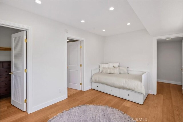 390 Saint Anns Dr, Laguna Beach, CA 92651 - bedroom with wood finished floors and recessed lighting