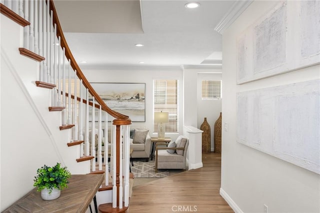 17 Marseille Way, Lake Forest, CA 92610 - staircase with wood finished floors, crown molding, and recessed lighting