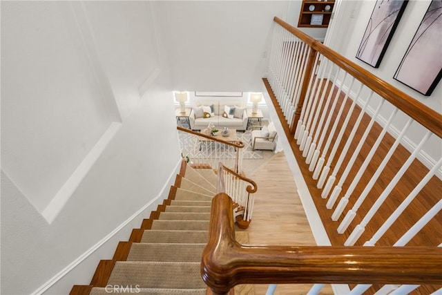 17 Marseille Way, Lake Forest, CA 92610 - staircase featuring a high ceiling and wood finished floors