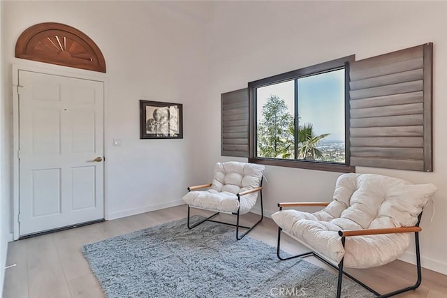 1369 Paseo Redondo, Burbank, CA 91501 - sitting room featuring baseboards and wood finished floors