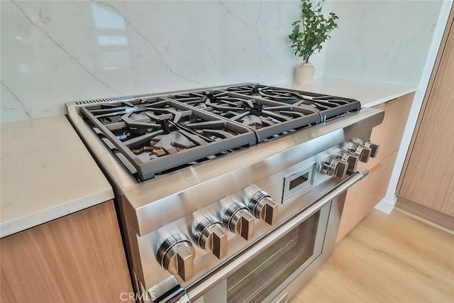1369 Paseo Redondo, Burbank, CA 91501 - kitchen view of high end stainless steel range oven, light wood-style floors, and light countertops