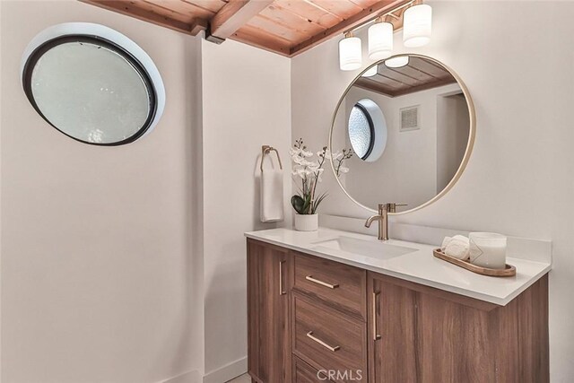 1369 Paseo Redondo, Burbank, CA 91501 - bathroom with a wooden ceiling with exposed beams and vanity
