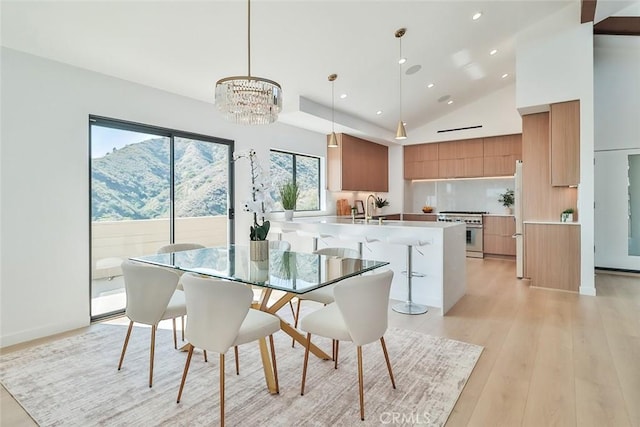1369 Paseo Redondo, Burbank, CA 91501 - dining area featuring a chandelier, recessed lighting, light wood-style floors, a mountain view, and high vaulted ceiling