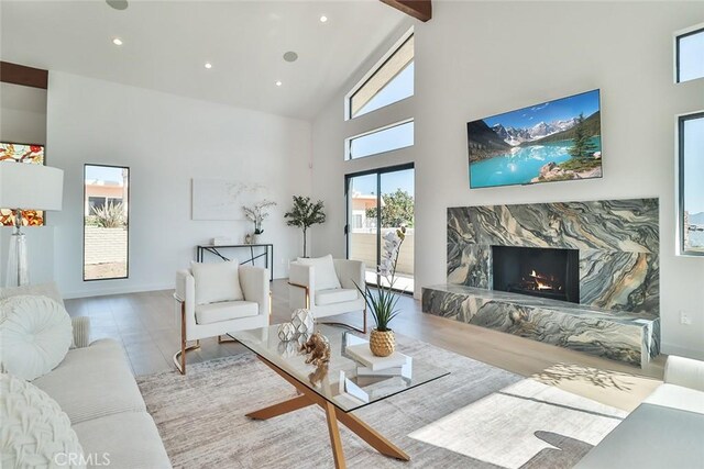 1369 Paseo Redondo, Burbank, CA 91501 - living room featuring high vaulted ceiling, a premium fireplace, beam ceiling, and recessed lighting