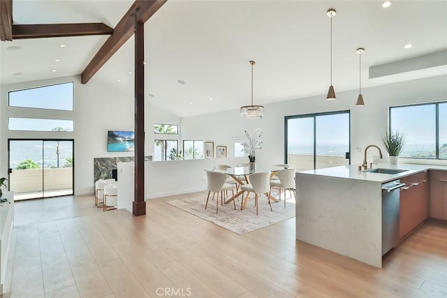 1369 Paseo Redondo, Burbank, CA 91501 - kitchen with dishwasher, open floor plan, modern cabinets, beamed ceiling, and healthy amount of natural light