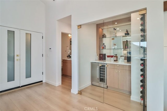 1369 Paseo Redondo, Burbank, CA 91501 - indoor dry bar featuring wine cooler and light wood-type flooring